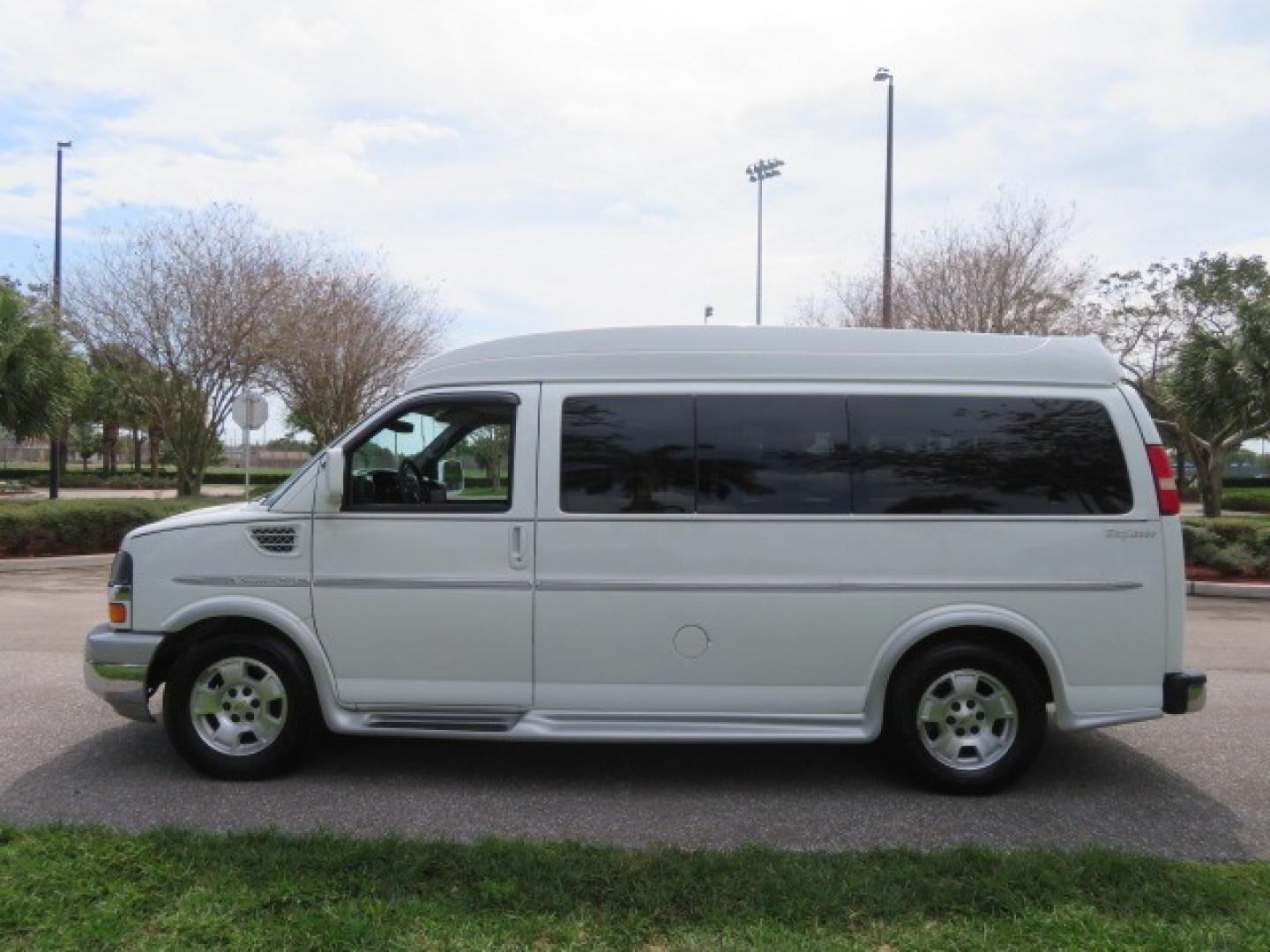 2010 White /Gray Chevrolet Express (1GNUGCD48A1) , located at 4301 Oak Circle #19, Boca Raton, FL, 33431, (954) 561-2499, 26.388861, -80.084038 - You are looking at a Gorgeous 2010 Chevy Express Handicap Wheelchair Conversion Van Explorer Limited SE with 31K Original Miles, Braun Century 750lb Side Entry Wheelchair lift, Tie Down System in the Floor, Rear Entertainment with Flat Screen TV/DVD, Leather Interior, Rear Power Folding Bench Seat/b - Photo#13